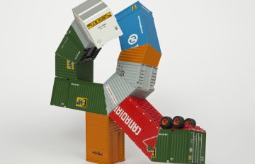 Multi-colored colored HO scale model parts of a toy truck merged with shipping containers