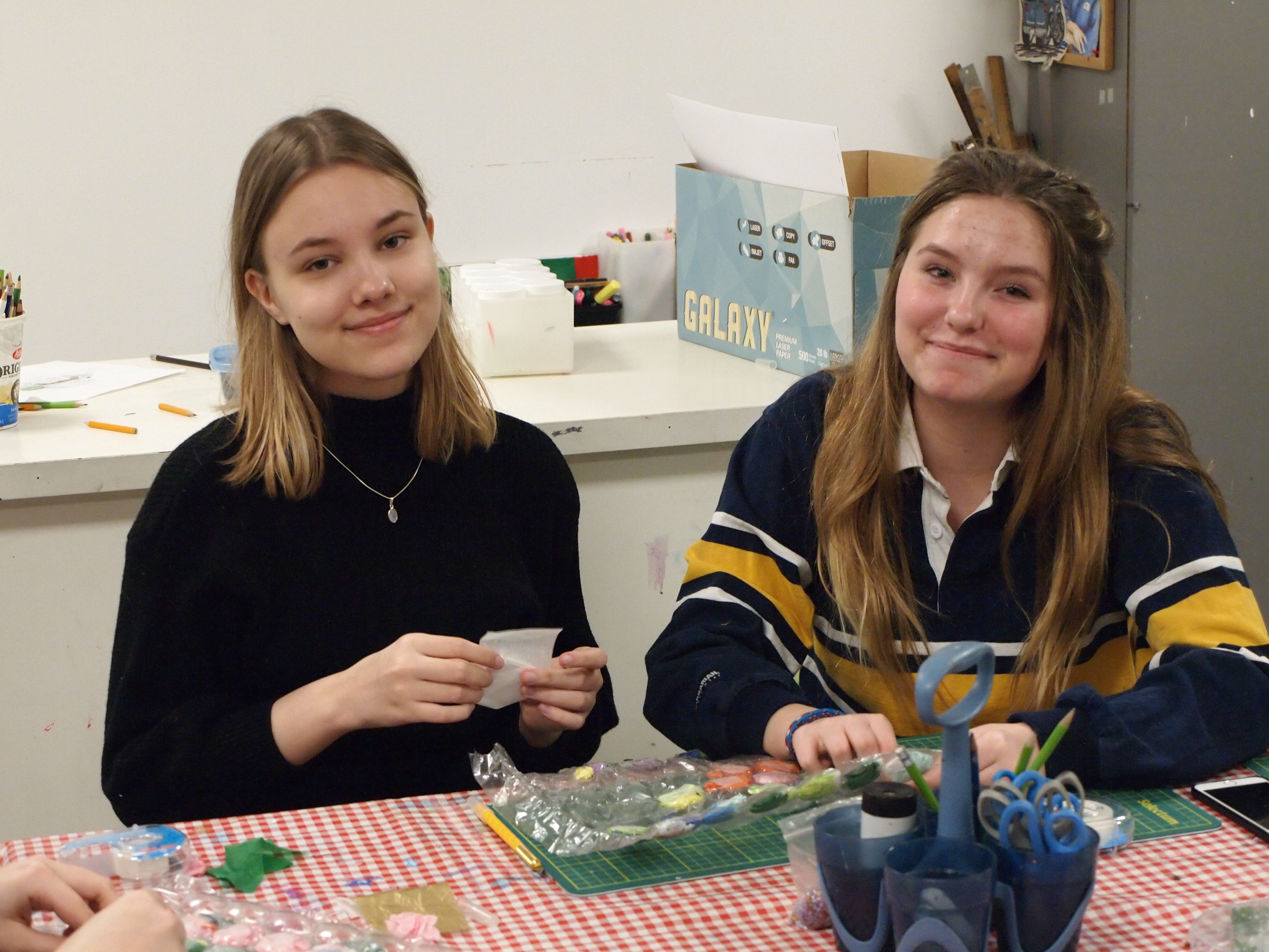 Group photo of teenagers smiling at the camera