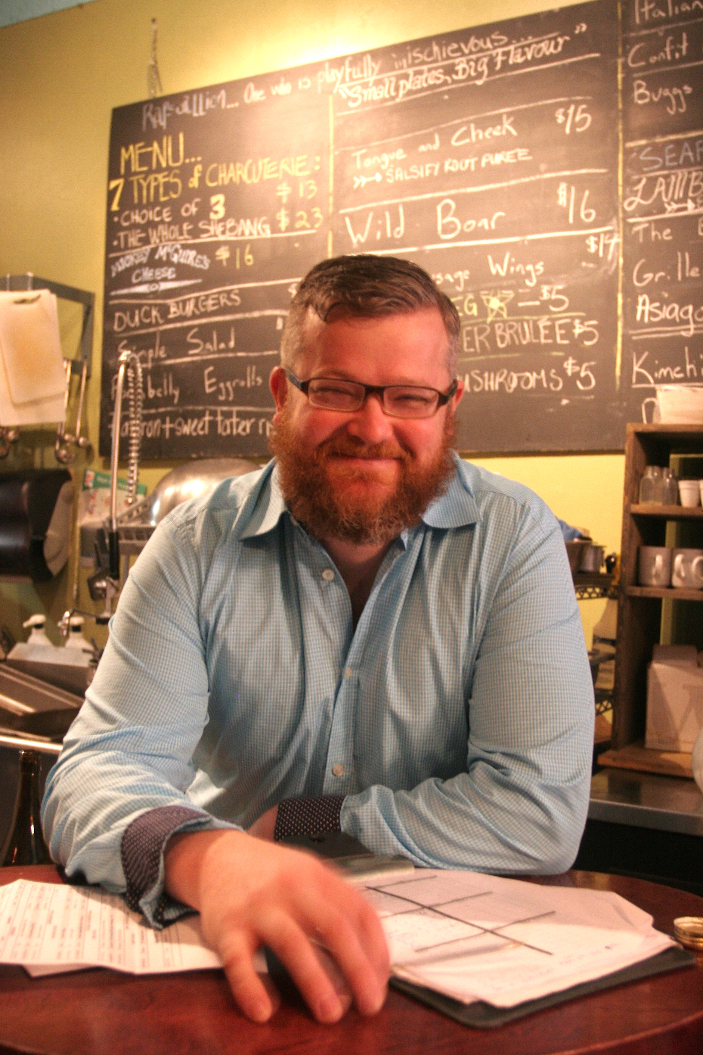 Photo of Chef Matt Kershaw behind the counter of Rapscallion Rogue Eatery