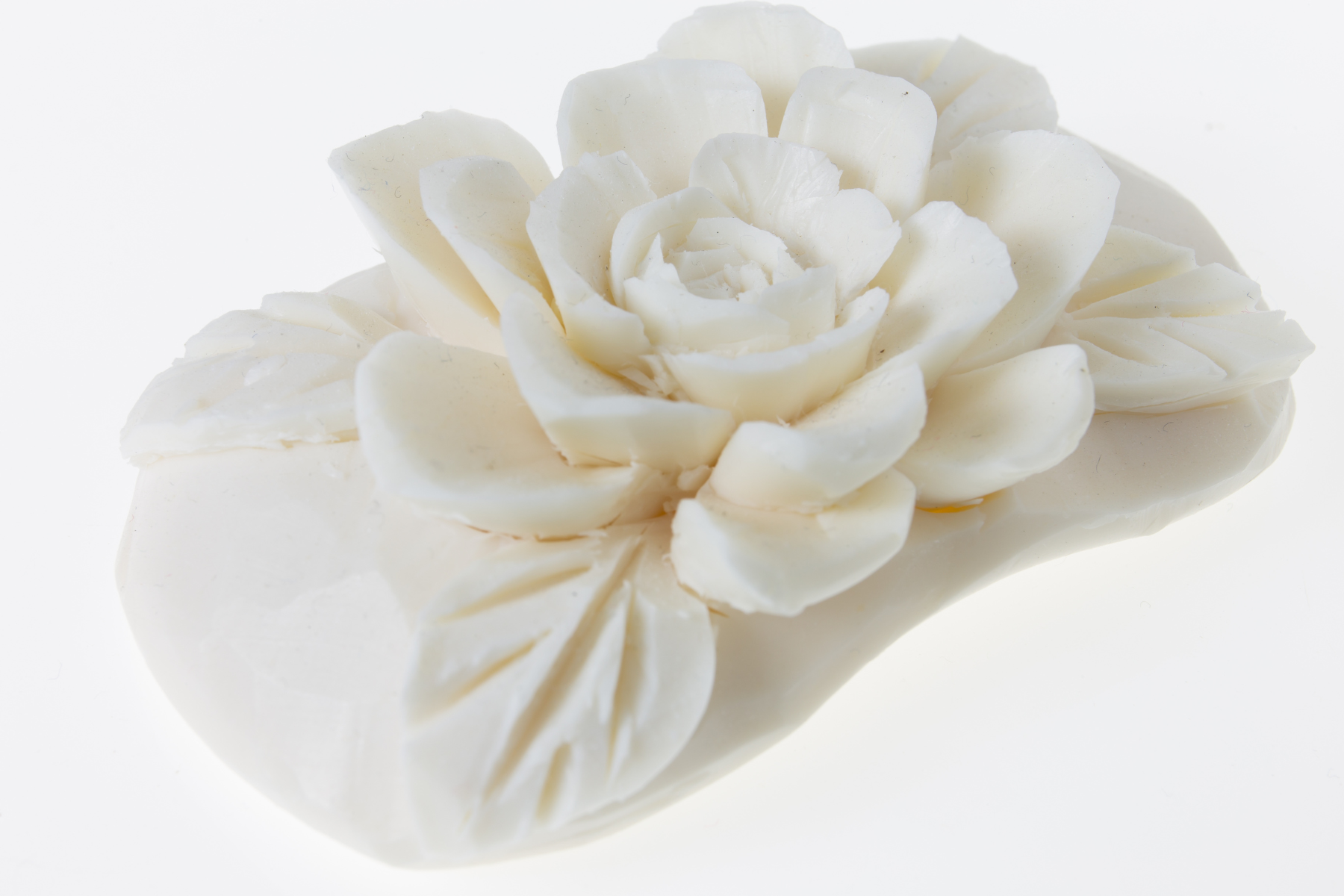 image of a bar of soap carved into a flower