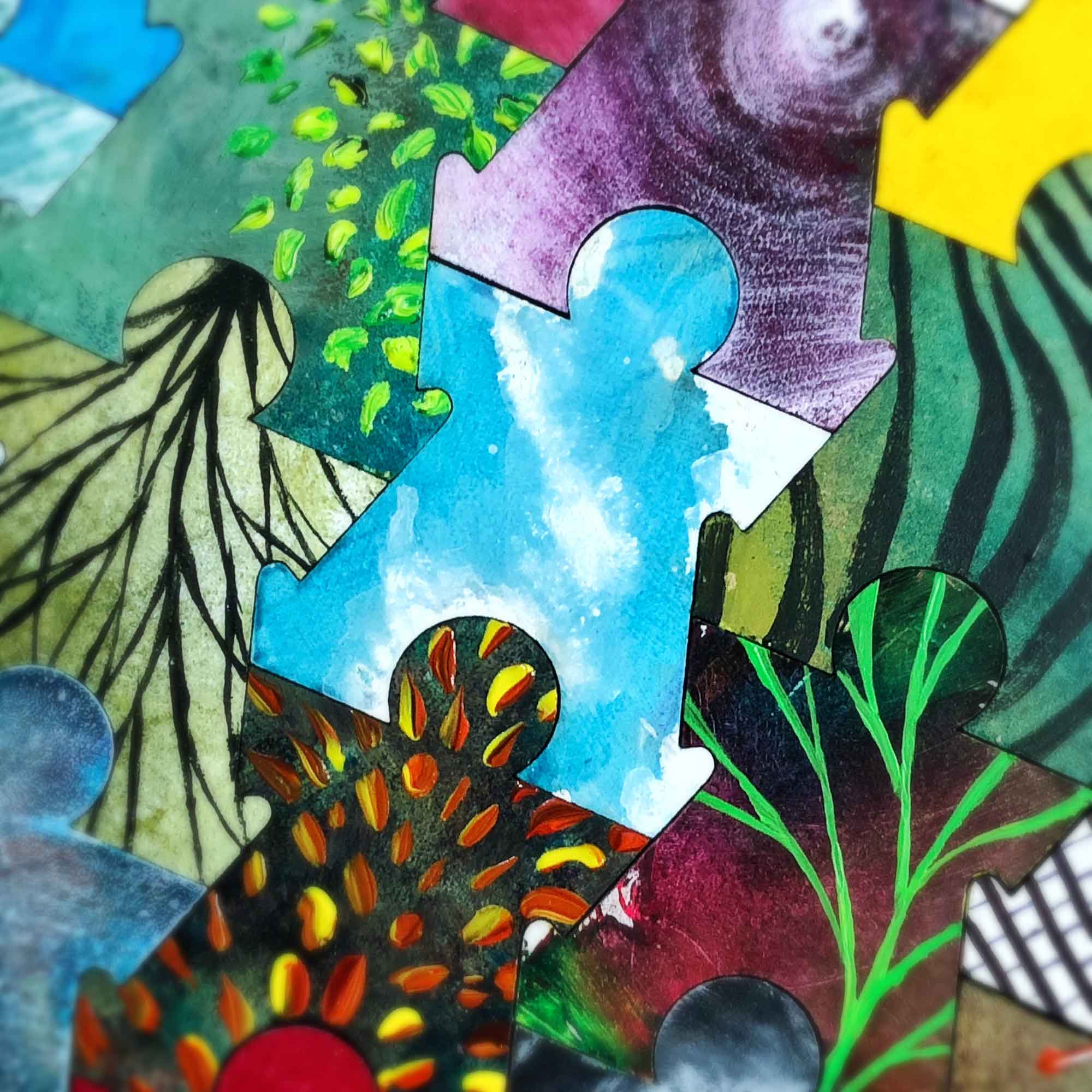 Partial view of a series of hand-painting interlocking tiles shaped as stylized human figures