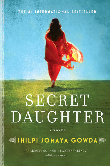 Cover of Secret Daughter by Shilpi Somaya Gowda depicts a colourful image of an Indian woman in a flowing red sari walking away from the viewer on a field of green grass and bright blue sky