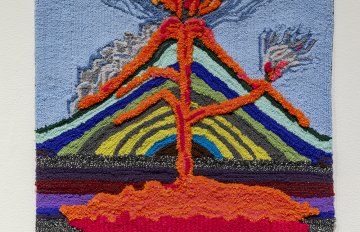 Brightly colored and textured image of a tufted volcano