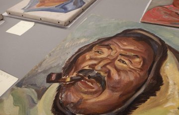View from above of an oil painting of an Inuit man 