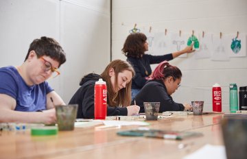 Photo of students engaging in an art activity