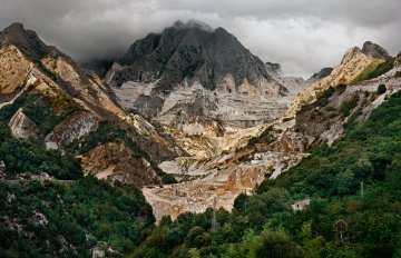 High top view of a mountain with clouds in the background