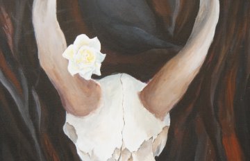 drawing of a horned animal skull with a white flower on one of the horns