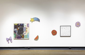 Installation shot of Derya Akay's assorted drywall sculptures with two square mixed media pieces