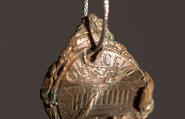 Close-up of a  cast of a coin