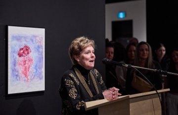 Regional Chair Karen Redmond giving a speech at the opening reception of Expressions 51