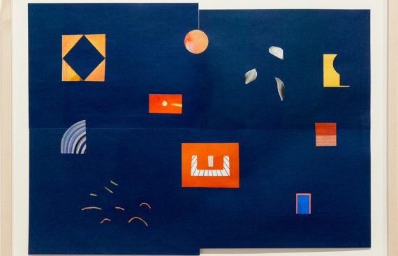 blue print with rnadom squares ad pieces of objects on it