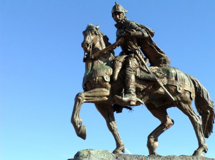 Photo of an equestrian statue of Juan de Onate against a blue sky