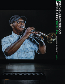 Man playing trumpet on video screen